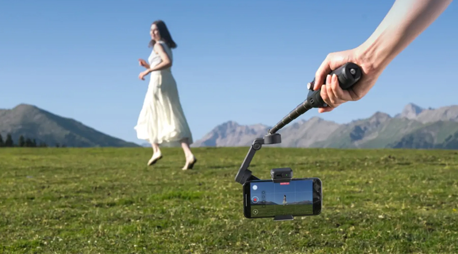 Person Filming someone in grass
